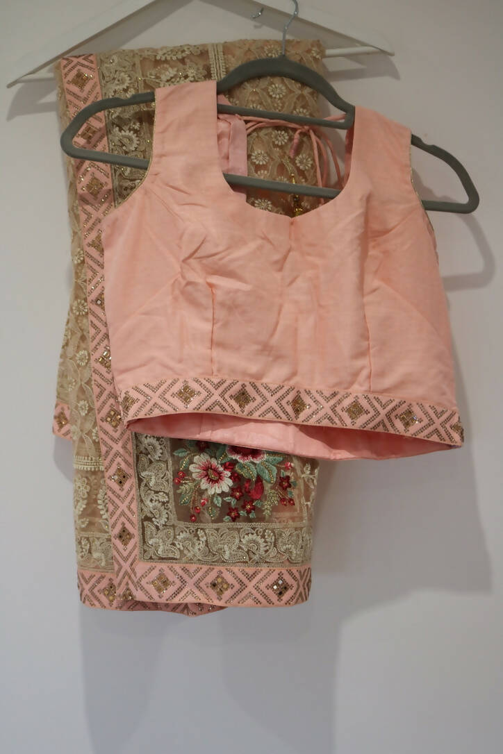 Pink and white embroidered Saree