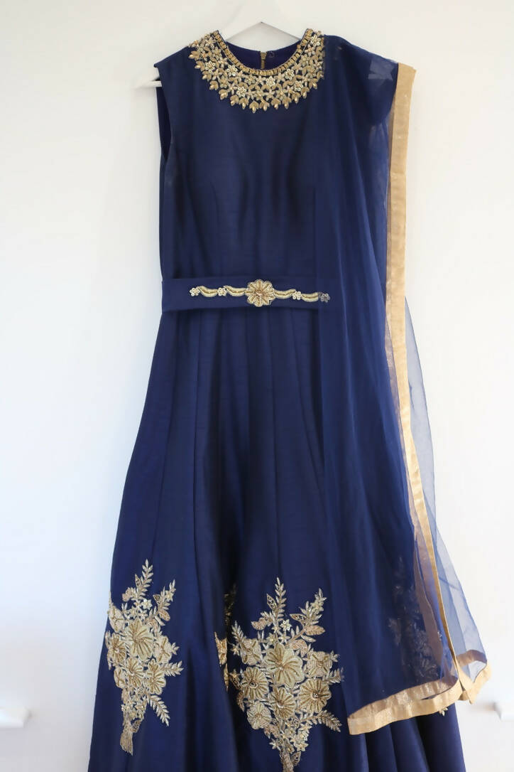 Navy blue dress with gold embellishments