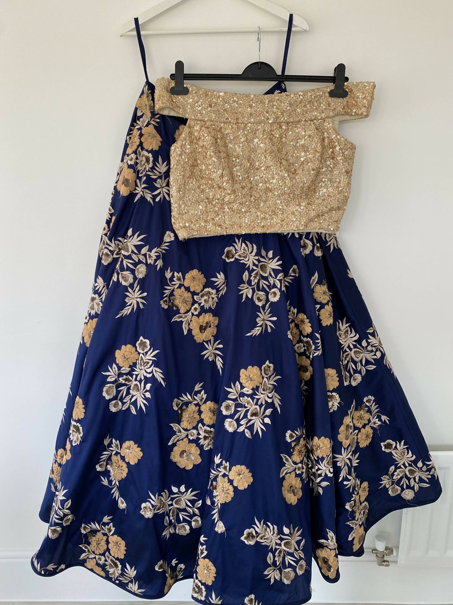 Blue floral lehenga with off the shoulder top